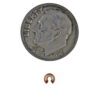 A coin and some small copper ring on top of it.