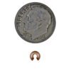A coin and some copper wire is next to it.