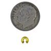 A coin and some gold colored beads on a white background