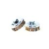 A pair of silver and brown beads sitting on top of each other.
