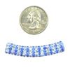 A coin and some blue and white rope