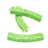 A green plastic bracelet with some type of material.