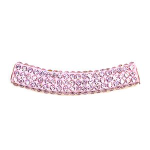 A pink diamond shaped barrette with three rows of diamonds.