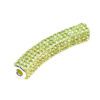A yellow diamond covered tube of beads.