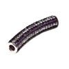 A purple tube with silver beads on top of it.