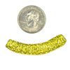 A small coin and some yellow beads