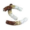 A pair of brown, white and silver beads.