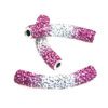 A pair of pink and white polka dot handlebars.