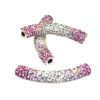 A pair of pink and white bracelets with rhinestones.