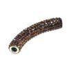 A brown tube of beads with a white background