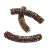 A set of four brown beads with silver accents.