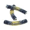 A pair of black and yellow beads with white accents.