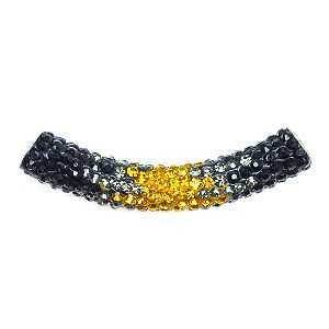 A black and yellow bracelet with some white dots