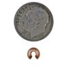 A coin and some copper wire is next to it.