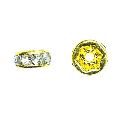 A pair of gold colored spacer beads with clear and yellow stones.