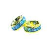 A pair of blue and green stones sitting on top of a white surface.