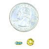 A coin and some small gold beads