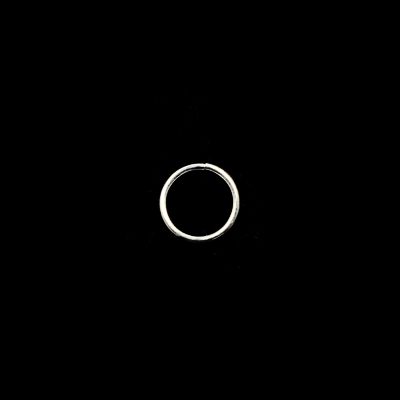 A ring of light is shown in the dark.