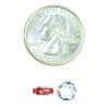 A coin and some red lights on top of it