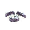A set of three purple rings sitting on top of each other.