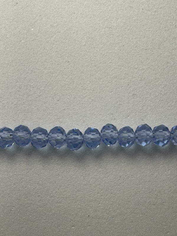 Row of light blue faceted beads.