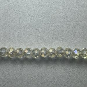 Row of iridescent glass beads.