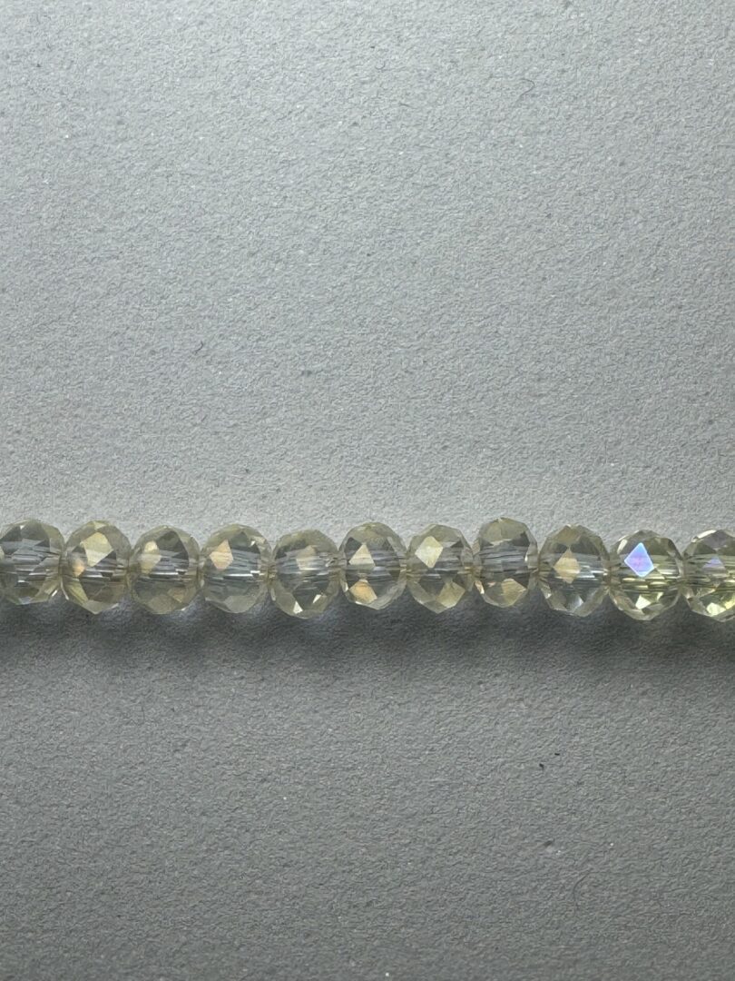 Row of iridescent glass beads.