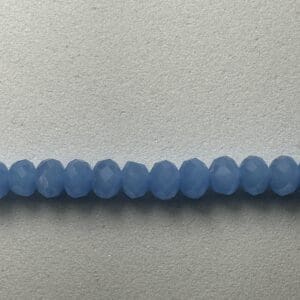 Row of light blue faceted beads.