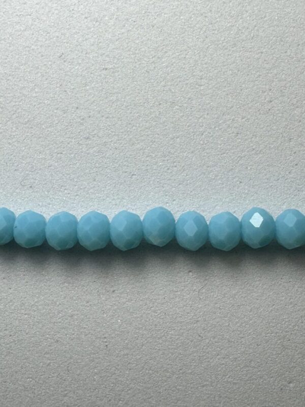 Row of light blue faceted beads.