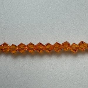 Amber crystal beads strand.