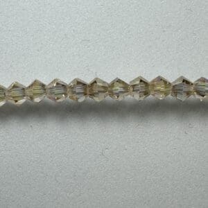 Light brown faceted glass beads.