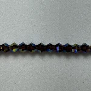 Iridescent dark brown glass beads.