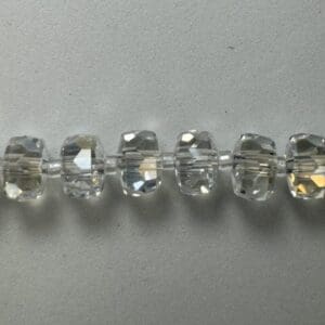 Clear crystal beads on string.
