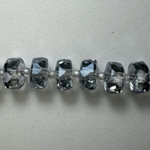 Gray crystal beads on string.