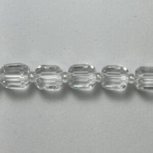 Faceted clear oval glass beads strand