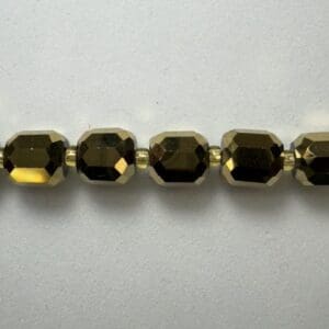Gold faceted glass bead necklace.
