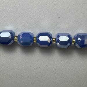 Blue faceted glass beads necklace.