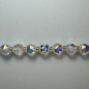 Here's an alt tag for the image: Iridescent crystal beaded necklace.