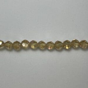 Pale amber faceted round glass beads strand