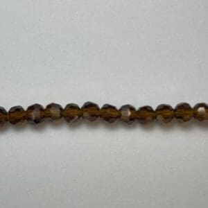 Tiny espresso faceted glass bead strand