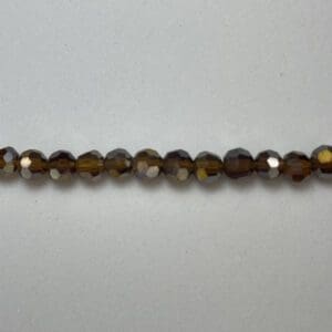 Small faceted smoky brown glass beads