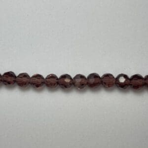 4mm faceted dark amber round beads