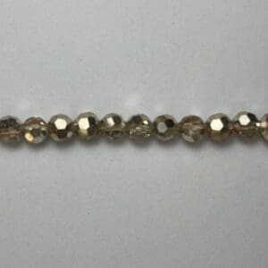 4mm pale gold faceted crystal beads