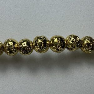 Gold lava rock beaded bracelet.
