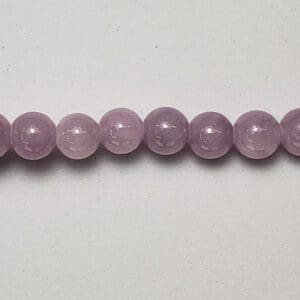 Lavender round gemstone beads strand.