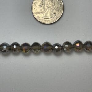 Dark gray faceted glass beads.
