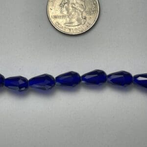 Cobalt blue faceted teardrop beads.