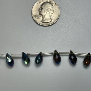 Dark blue teardrop crystal beads.