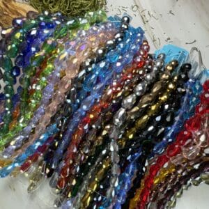 Colorful glass beads displayed on a surface.