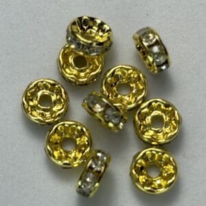 Gold and silver rhinestone spacer beads.